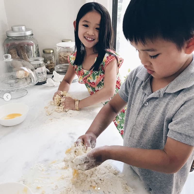 Kellie's chidren Zoey and Axel are busy making dough in the kitchen