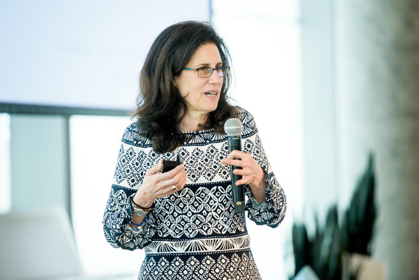 Carol Fishman Cohen speaking at 2019 Chicago conference keynote presentation